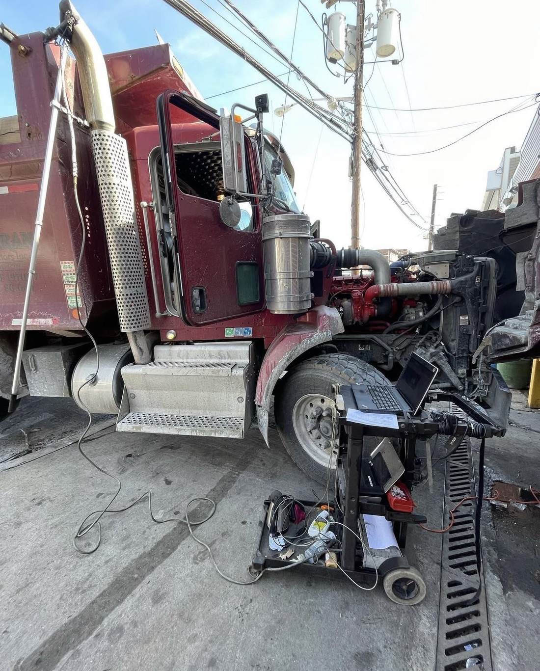Diesel truck undergoing emissions diagnostic testing